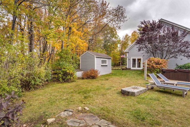 view of yard featuring a storage shed