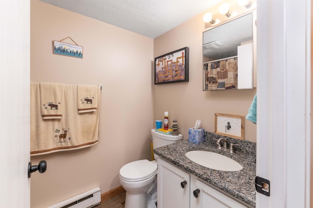 bathroom with toilet, a baseboard radiator, hardwood / wood-style floors, vanity, and a textured ceiling