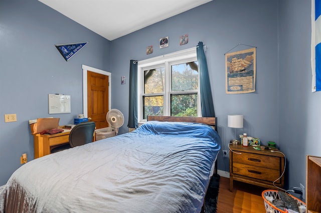 bedroom with wood-type flooring