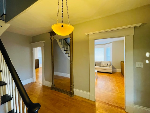 hallway featuring hardwood / wood-style floors