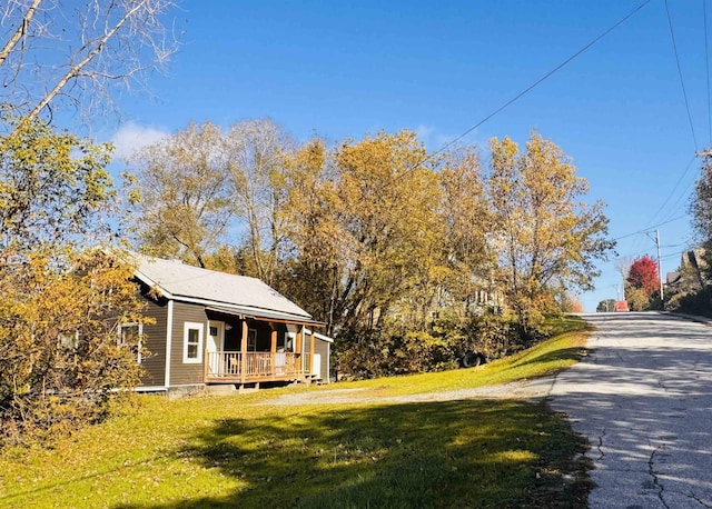 10 N Ave, Richford, VT 05476 - view of front of home with a front yard, covered porch, and driveway