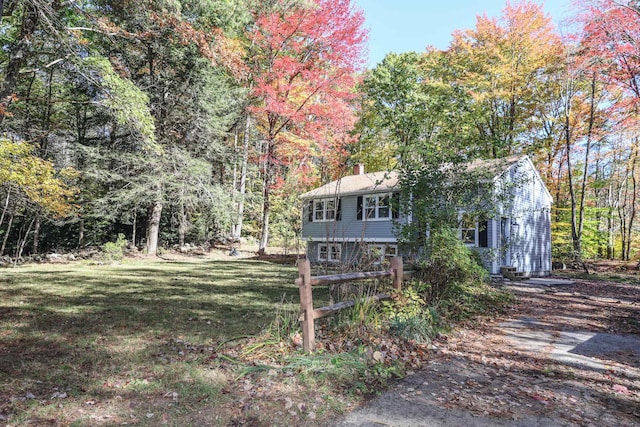 exterior space featuring a front lawn