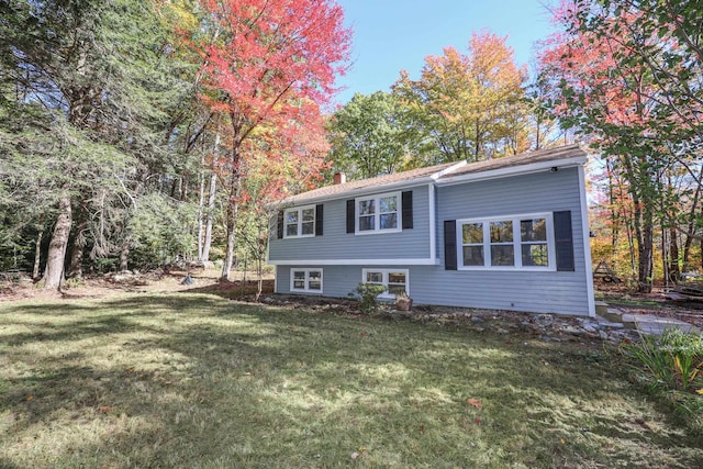 view of front facade with a front yard