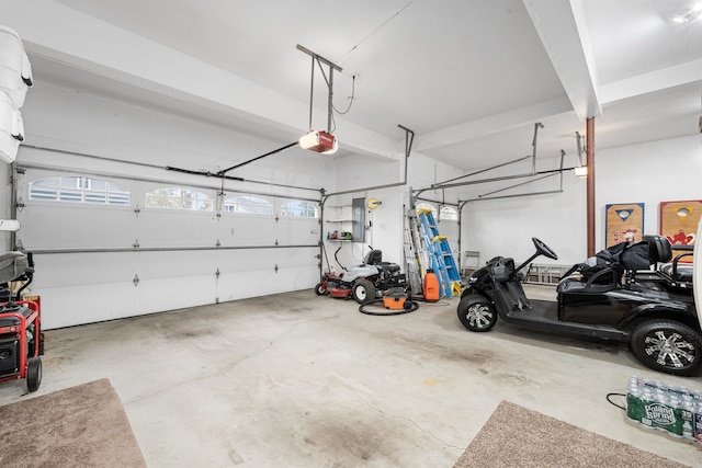 garage featuring a garage door opener