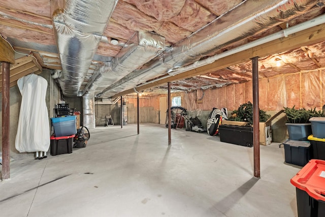 basement featuring water heater