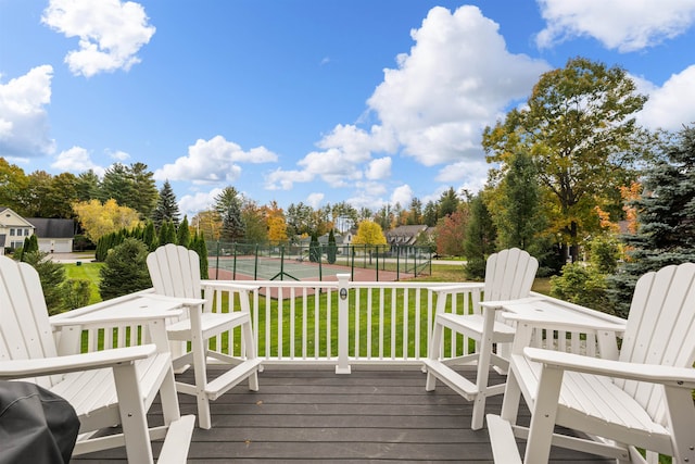 wooden terrace with a yard