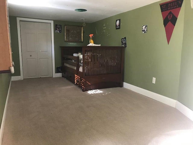 bedroom with a closet and carpet