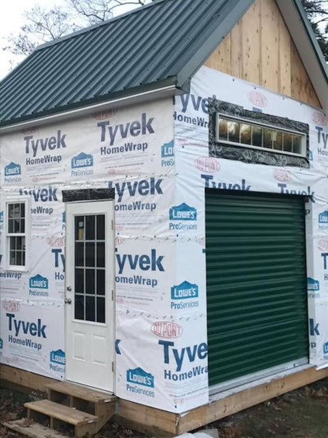 view of side of property featuring central AC unit