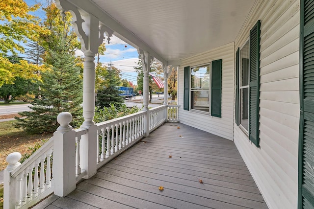 wooden deck featuring covered porch