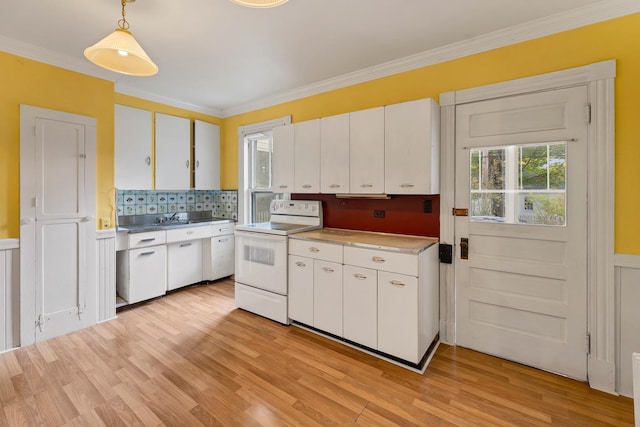 kitchen with white cabinets, white range with electric cooktop, and hanging light fixtures