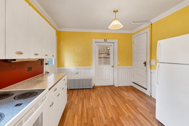 kitchen featuring white cabinetry, radiator, ornamental molding, pendant lighting, and white appliances