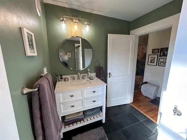 bathroom featuring vanity and hardwood / wood-style floors