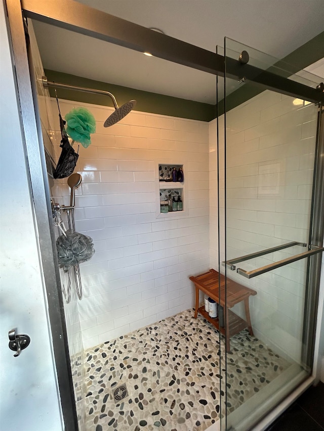 bathroom featuring walk in shower