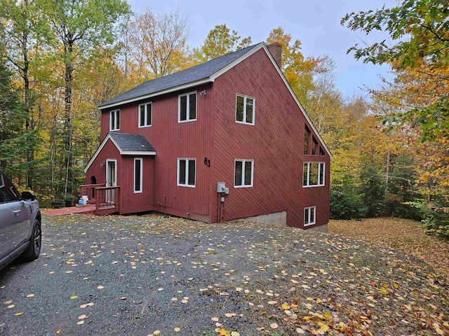 view of side of property with a deck