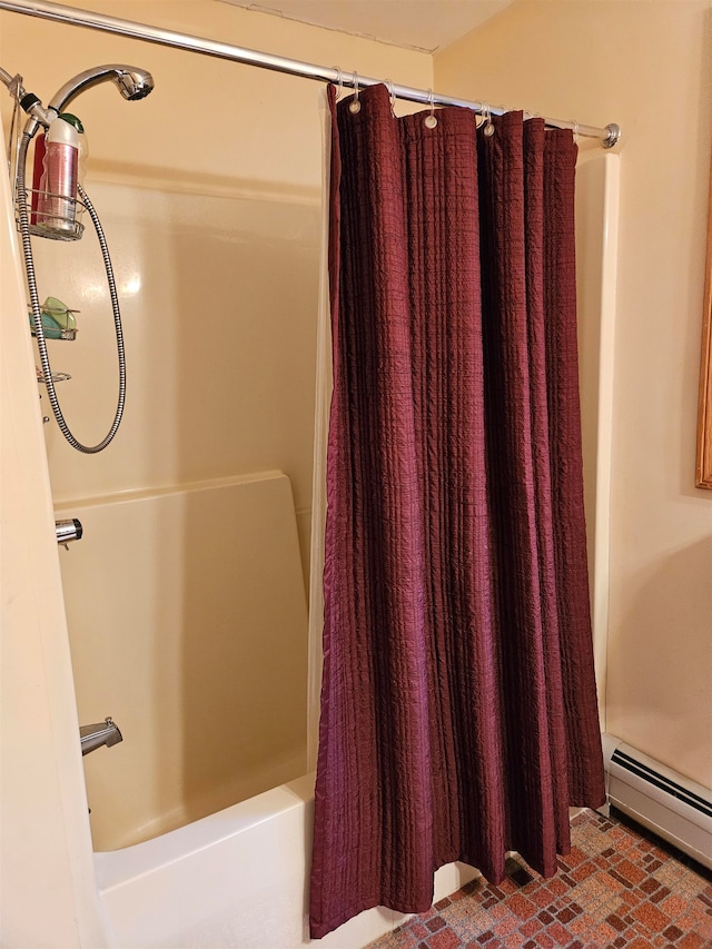 bathroom with shower / bath combination with curtain and a baseboard radiator