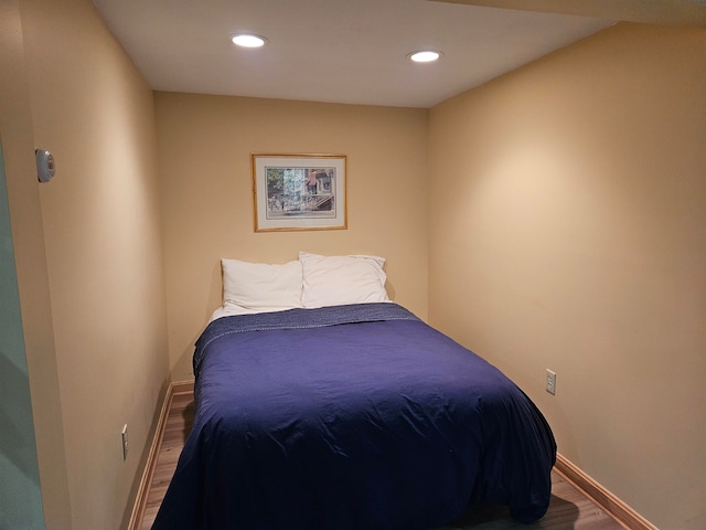 bedroom featuring hardwood / wood-style floors