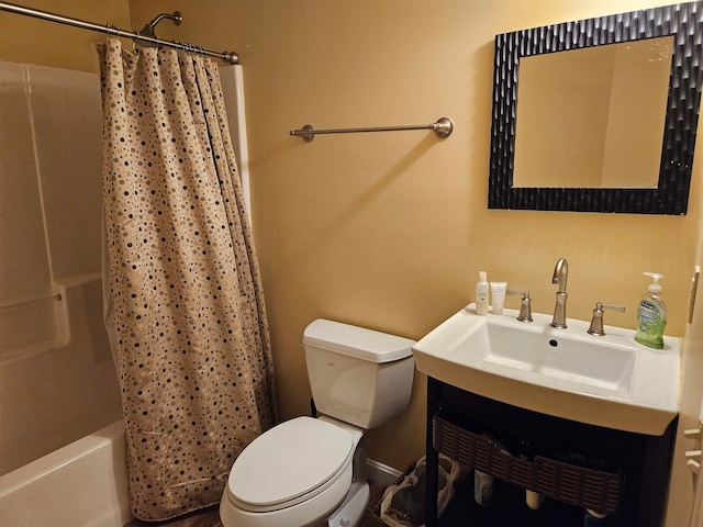 full bathroom featuring vanity, toilet, and shower / tub combo with curtain