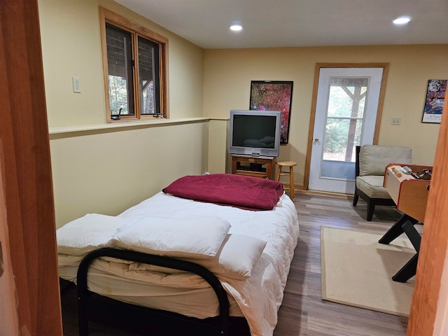 bedroom featuring hardwood / wood-style floors