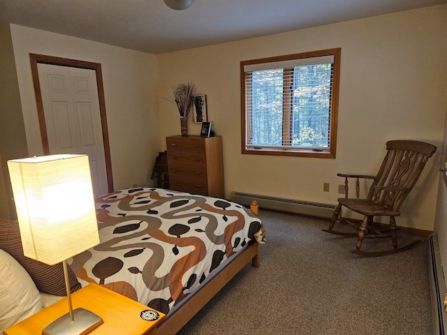 carpeted bedroom featuring a baseboard radiator