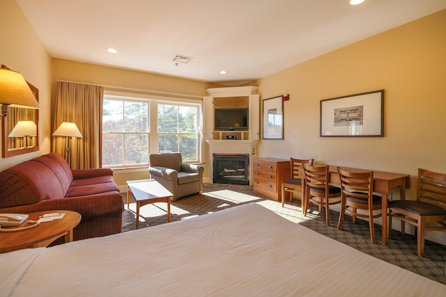 living room with dark colored carpet