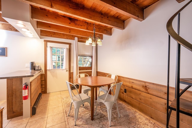 dining room featuring wood ceiling, beamed ceiling, light tile patterned floors, and a chandelier