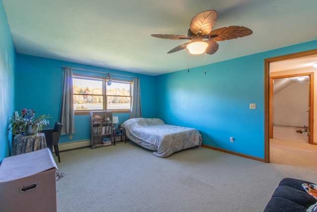 bedroom featuring ceiling fan, a baseboard radiator, and light colored carpet