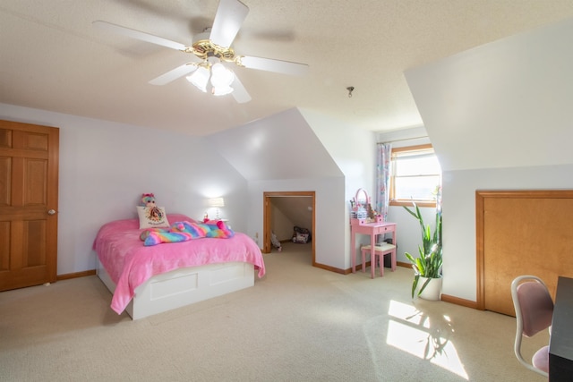 carpeted bedroom with ceiling fan and lofted ceiling