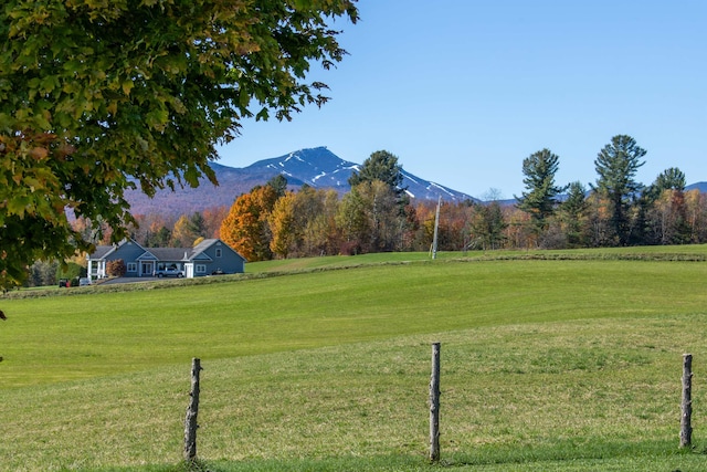 exterior space featuring a rural view and a mountain view