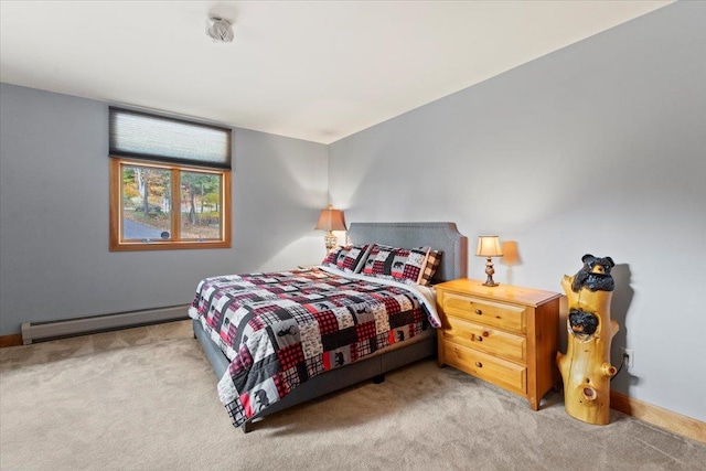 bedroom featuring light carpet and a baseboard radiator