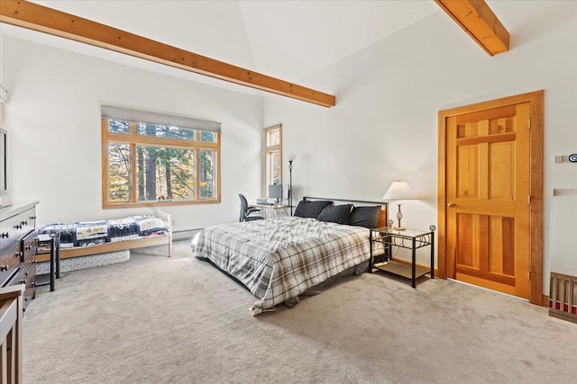 bedroom with carpet floors, beamed ceiling, and high vaulted ceiling