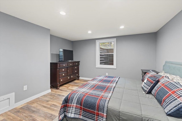 bedroom featuring light wood-type flooring