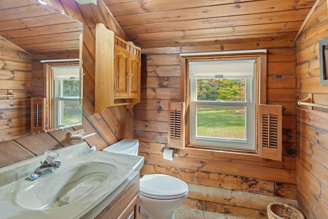 bathroom with lofted ceiling, wooden ceiling, toilet, plenty of natural light, and vanity