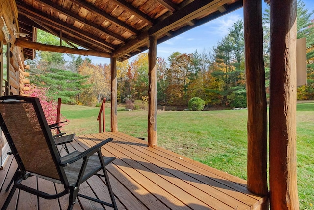 wooden deck with a yard