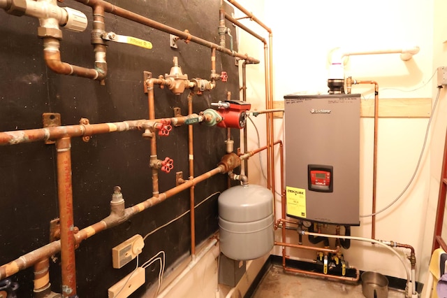 utility room with water heater