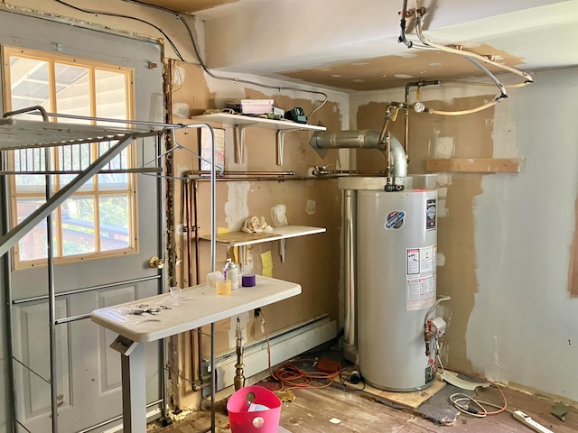 utility room with a baseboard heating unit and water heater