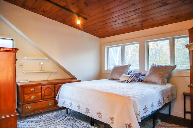 bedroom with wood ceiling