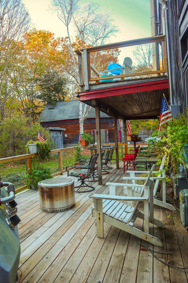 deck at dusk with a shed