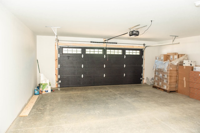 garage featuring a garage door opener