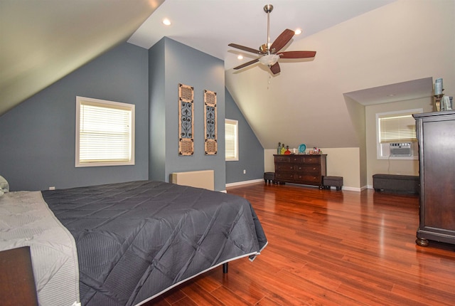 bedroom featuring ceiling fan, cooling unit, lofted ceiling, and dark hardwood / wood-style floors