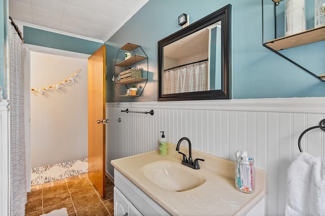 bathroom with vanity, crown molding, tile patterned floors, and a shower with shower curtain