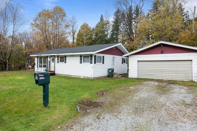 ranch-style home with a front lawn