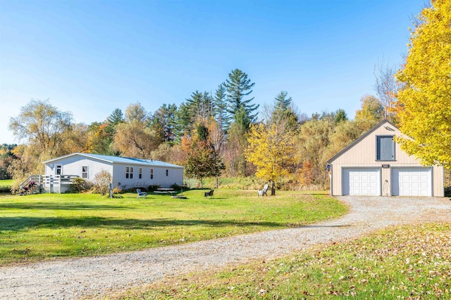 exterior space featuring an outbuilding and a garage