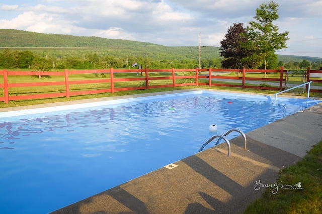 view of pool featuring a mountain view