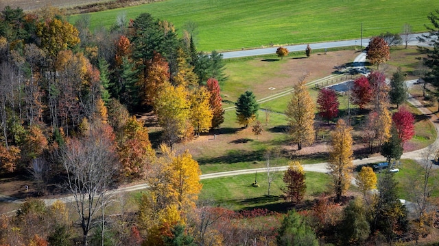 birds eye view of property with a rural view