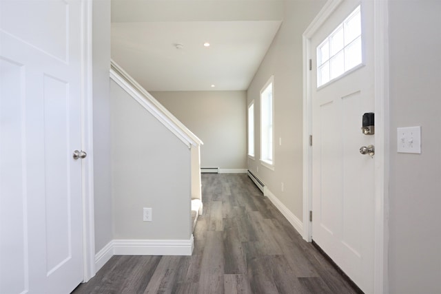 158 Deer Creek Ln, Saint Johnsbury, VT 05819 - entryway with baseboards, a baseboard radiator, dark wood finished floors, and stairs