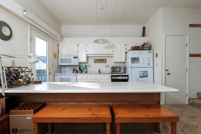 kitchen with pendant lighting, wood ceiling, carpet, and white appliances