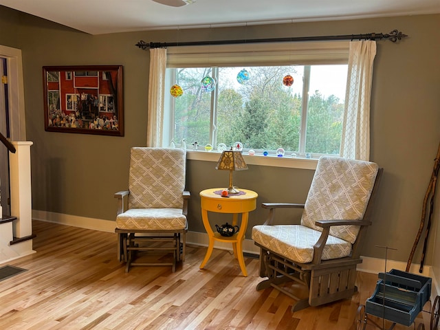 living area with wood-type flooring