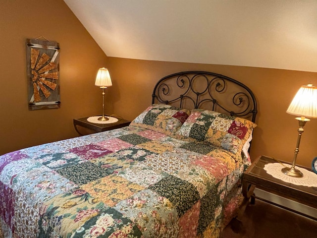 bedroom featuring vaulted ceiling