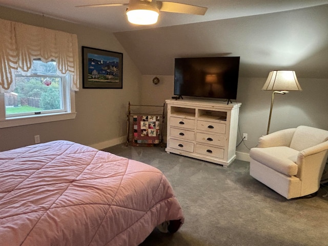 bedroom featuring ceiling fan, lofted ceiling, and dark colored carpet