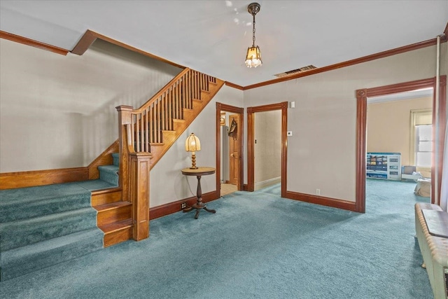 stairway with crown molding and carpet floors